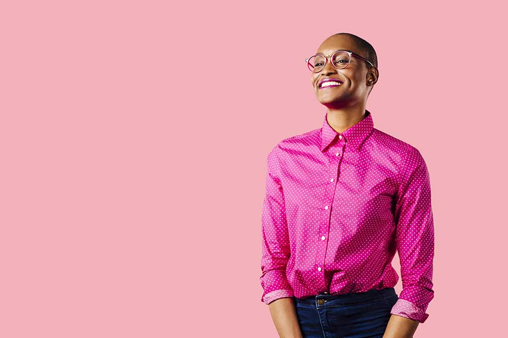 3-portrait-of-a-young-smiling-woman-in-pink-iStock-1175126160