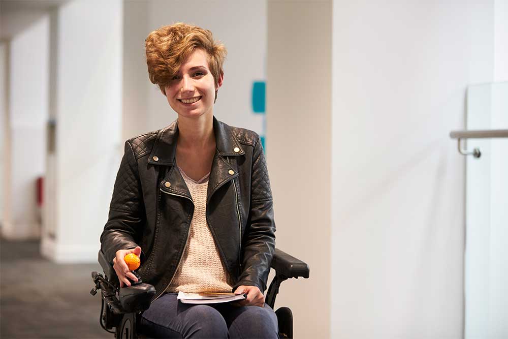 8-disabled-female-university-student-smiling-iStock-597958658